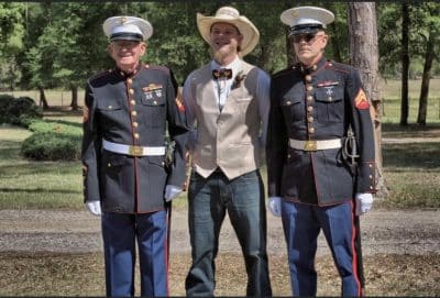men in military uniforms with the groom on the ranch, Orlando, FL
