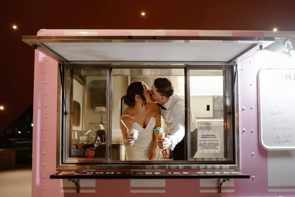 bride and groom kissing inside a food truck Orlando, FL