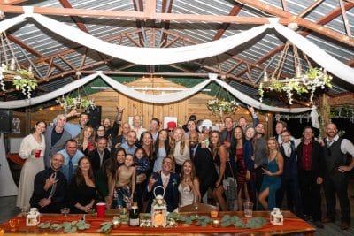 photo of the guests at the wedding, bride and groom sitting at their head table, S&S Ranch, Orlando, FL