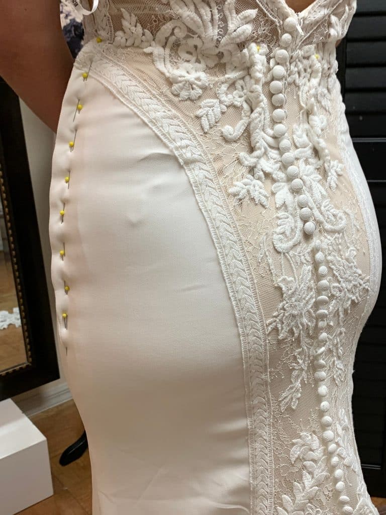 bodice work on a white dress, lace with white covered buttons, Sewing by Marilyn, Orlando, FL