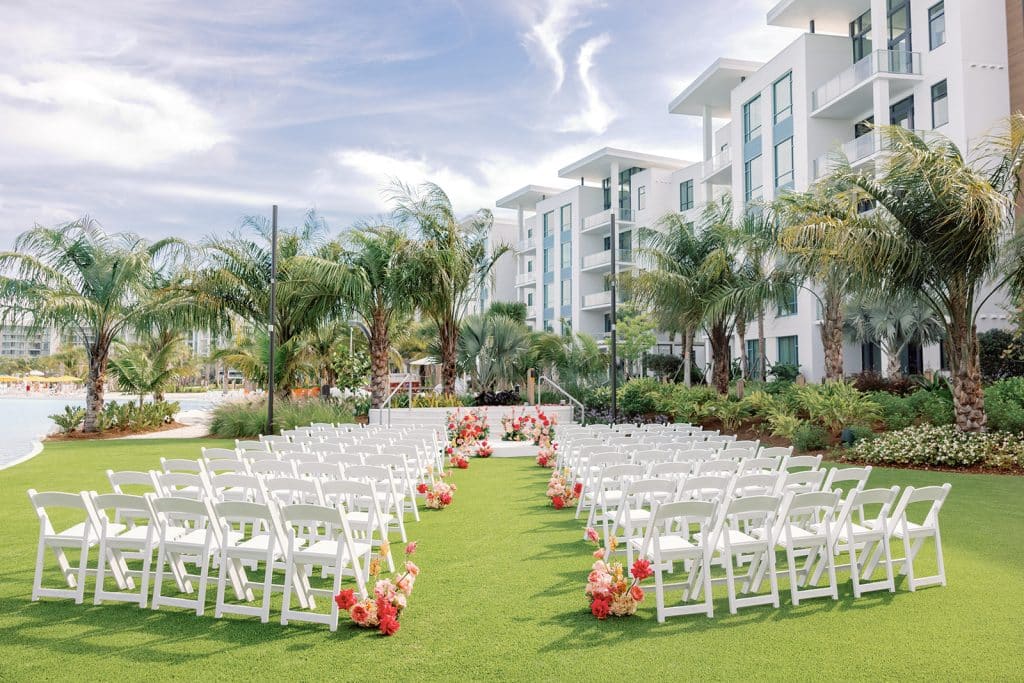 wedding ceremony set up outdoors, white chairs in rows, Evermore Orlando Resort