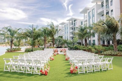 wedding ceremony set up outdoors, white chairs in rows, Evermore Orlando Resort