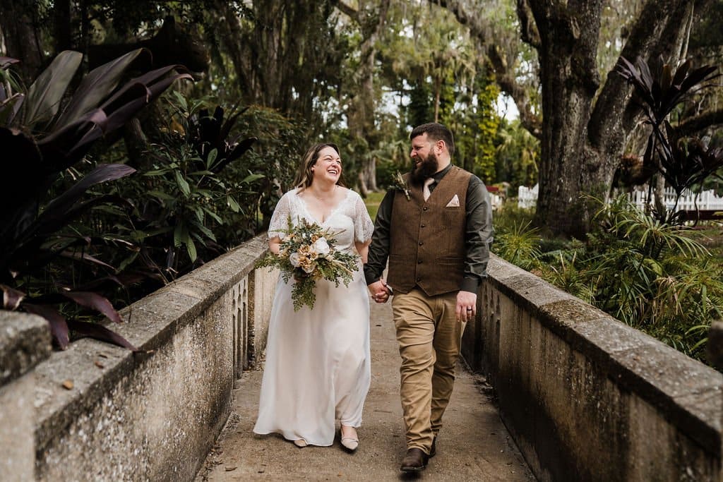 Wedding Couple walking on a concrete bridge, through the park, Author Made Photo and Video, Orlando, FL