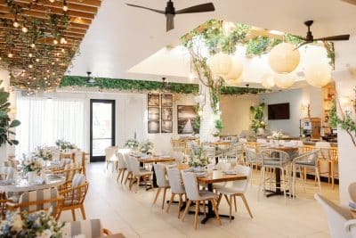 beautiful space, ceiling fans, wooden chairs with white backs, Orlando, FL