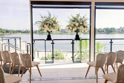 lake side view, terrace area, chairs set up in rows for a ceremony, view of the lake, Summer House on the Lake, Orlando, FL