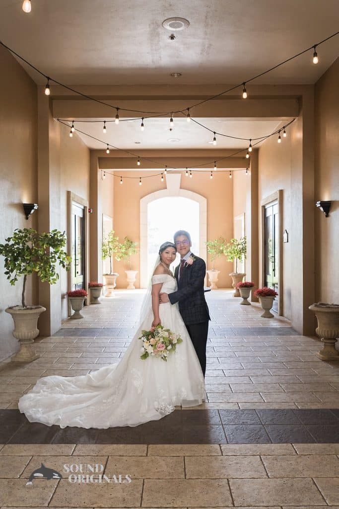 bride and groom posing together for the camera, hallway foyer, Falcon's Fire Golf Club, Orlando, FL