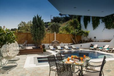 daytime at the villas, pool area, patio furniture, Wine Dark Sea Villas, Orlando, FL