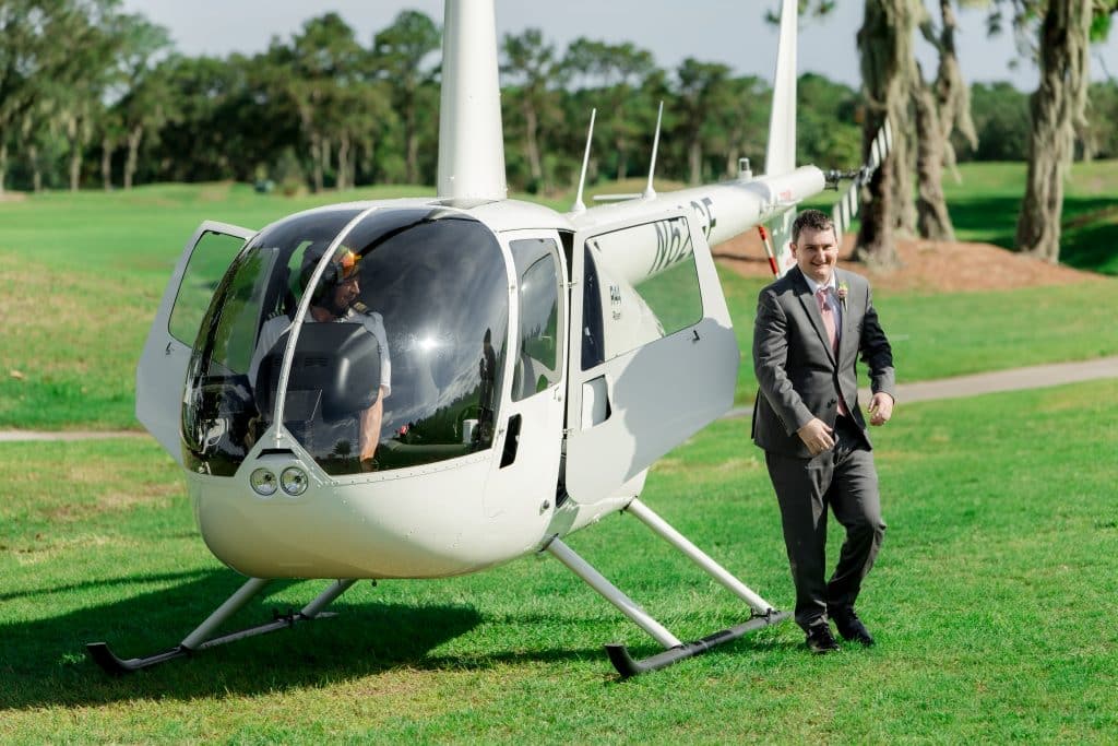 white helicopter, groom arriving to the ceremony, golf course, Orlando, FL