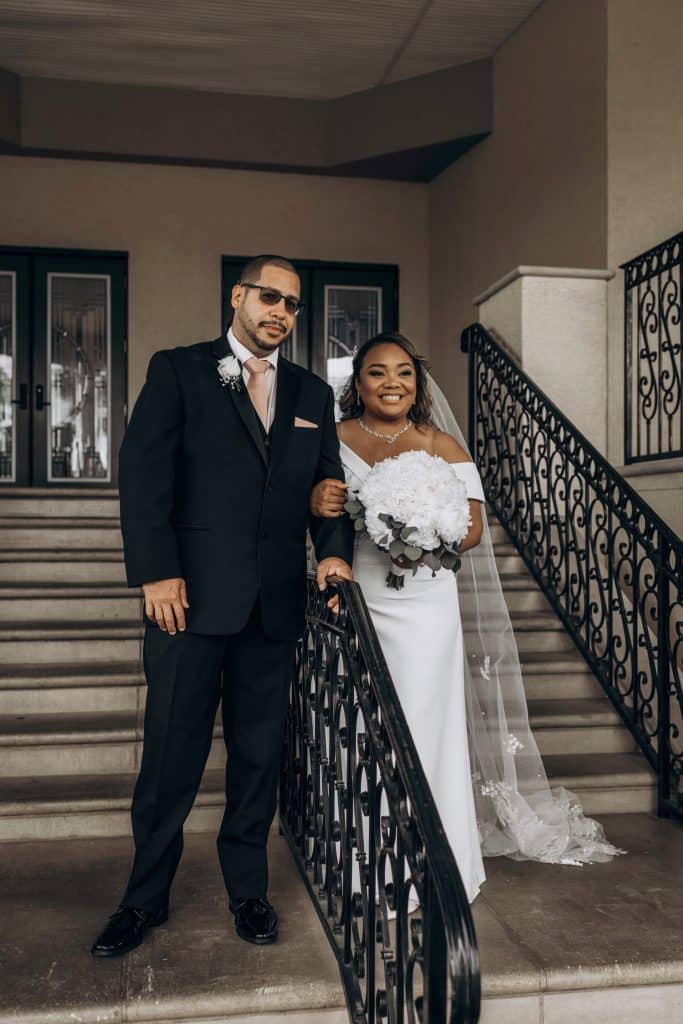 bride and groom posing on the stairs, Ventura Country Club, Orlando, FL