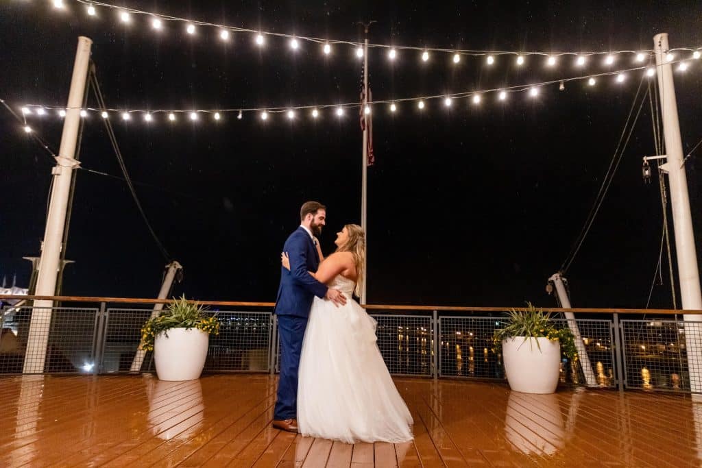 bride and groom dancing on the dance floor, top deck, twinkle lights, Paddlefish, Orlando, FL