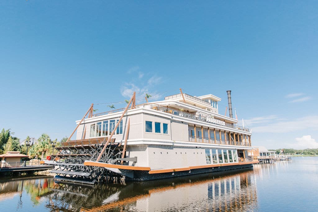 photo of the Paddlefish boat in the water, near the dock, Disney Springs, Orlando, FL