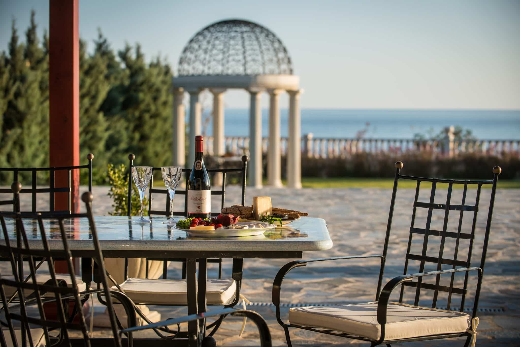 Outdoor Destination Wedding in Greek islands with ocean view and gazebo