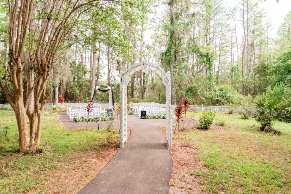 view of the wedding ceremony set up, altar, rows of chairs, outdoors, Orlando, FL