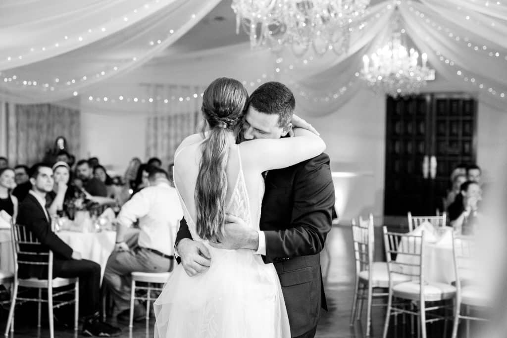 black and white image of burgundy and navy wedding
