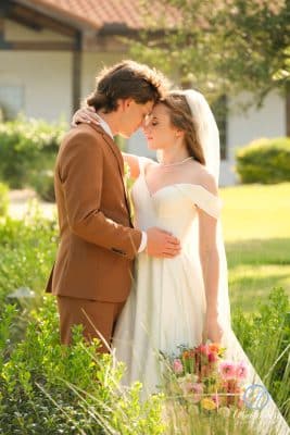 bride and groom standing with their faces touching, embracing, Sterling Event Venue, Orlando, FL
