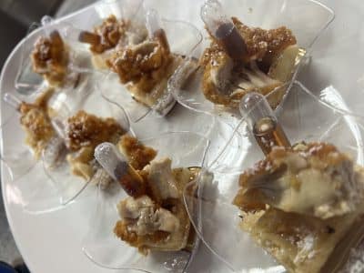 delicious dessert in a clear cup with a pipette of syrup to accompany it, Orlando, FL