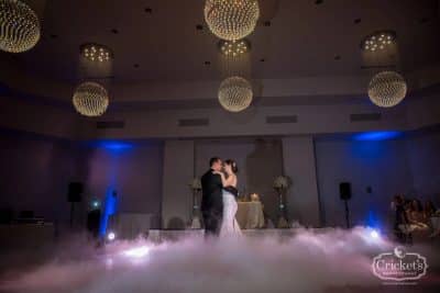 bride and groom dancing on the dance floor, fog rolling across the floor, blue uplighting, Renaissance Orlando Resort and Spa, Orlando, FL