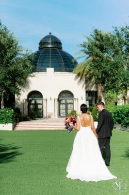 bride and groom walking together towards the venue, The Alfond Inn, Orlando, FL
