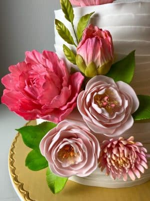 close up of the pink and fascia flowers on a wedding cake, Orlando, FL