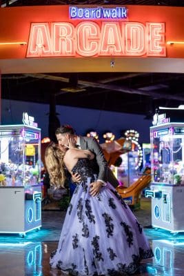 bowling, arcade, events, bride and groom kissing at the entrance to the arcade, The Bridge Event Center, Orlando, FL