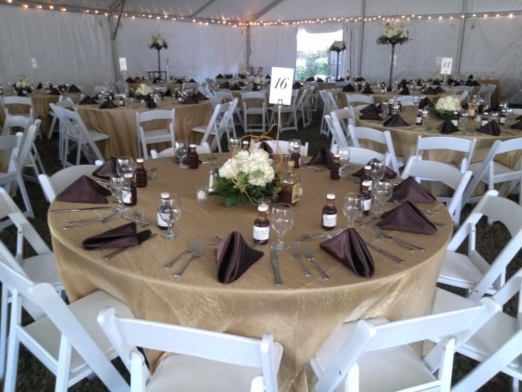 party rentals, tables, white chairs, gold tablecloths, black napkins, Orlando, FL