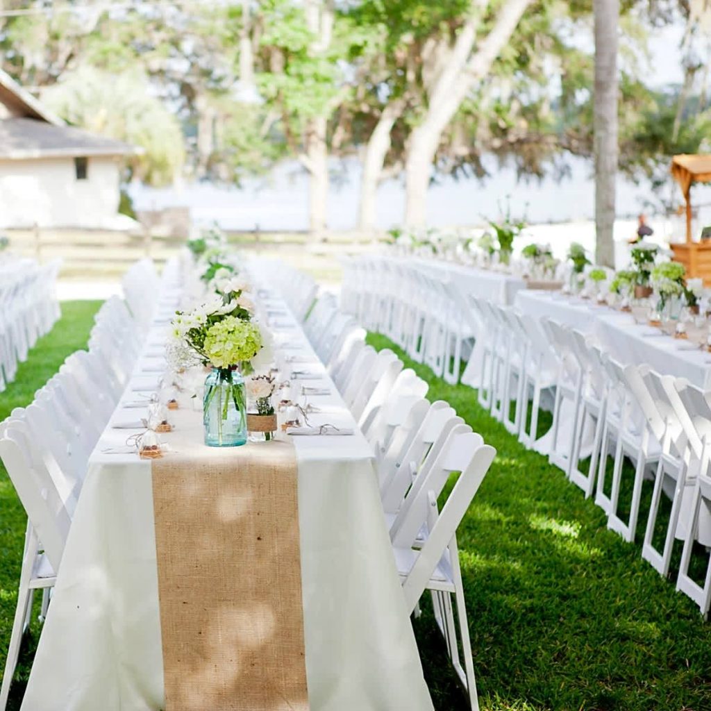 reception set up, long table, white tablecloth, brown runner, white chairs, Orlando, FL