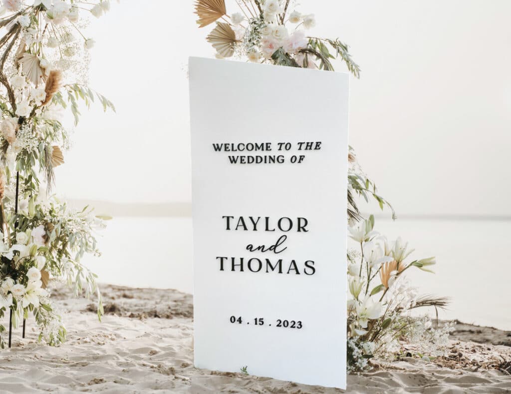 wedding sign for Taylor and Thomas, floral arch, near the beach, Petal + Grain Designs, Orlando, FL