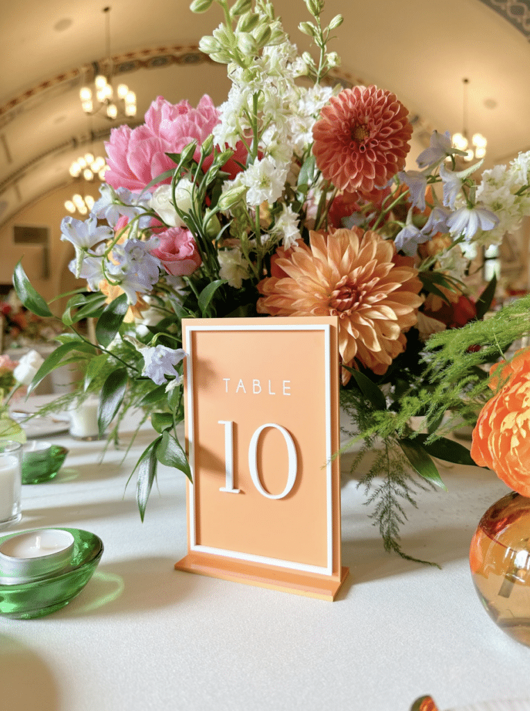 table sign, number 10, floral arrangement in the center of the table, Orlando, FL