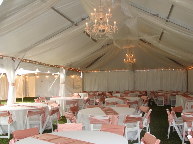 large pavilion, rentals of tables and chairs, white tablecloths, pink runners and pink chair covers, Orlando, FL