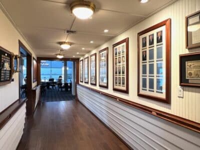 hallway leading to the dining room, photos lining the hallway, Mount Dora Yacht Club, Orlando, FL