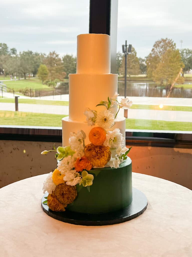 four tiered cake, flowers adorned on the sides, Orlando, FL