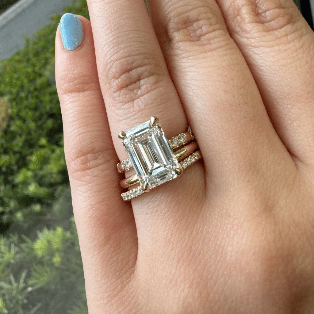 engagement ring and wedding band on bride's finger, Orlando, FL