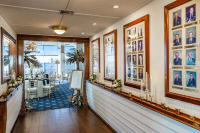 hallway leading to the dining room, photos lining the hallway, Mount Dora Yacht Club, Orlando, FL