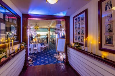 hallway leading to the dining room, photos lining the hallway, Mount Dora Yacht Club, Orlando, FL