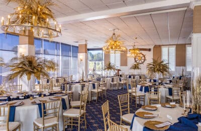 large dining room at the yacht club, gold and blue, Orlando, FL