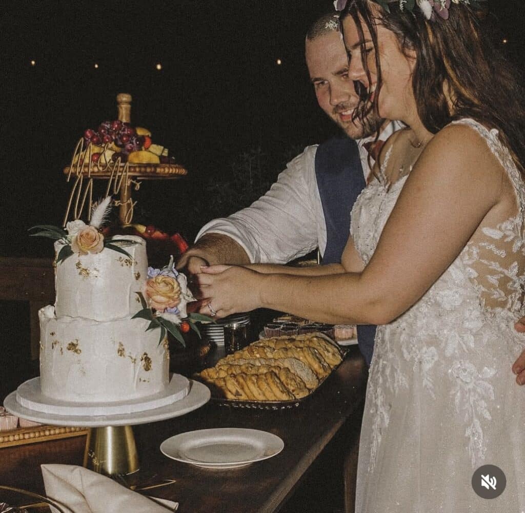 bride and groom cutting their wedding cake, Orlando, FL