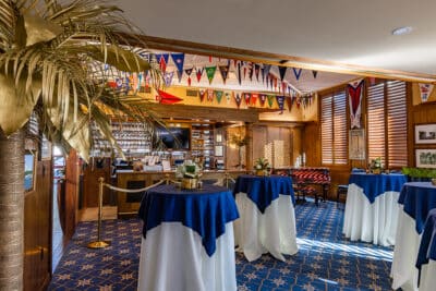 pre-function area, high top tables with white and blue tablecloths, Mount Dora Yacht Club, Orlando, FL