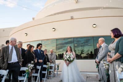 bride walking down the aisle, guests watching, Sonacity Photography, Orlando, FL