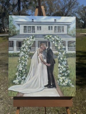 oil painting of the bride and groom kissing at the front of their venue, Orlando, FL