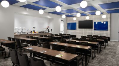 conference room, long tables with three chairs at each, Orlando, FL