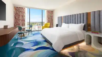 hotel room, king bed, large window, balcony, Lake Nona Wave Hotel, Orlando, FL