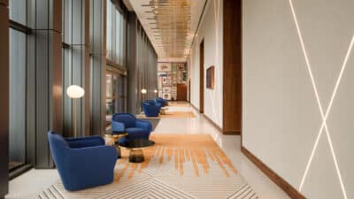 hotel hallway, blue chairs, orange and tan carpet, Orlando, FL