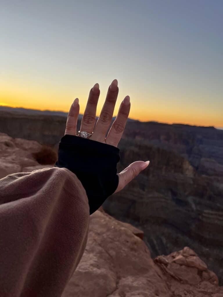 Fiance showing off her engagement ring after her Grand Canyon marriage proposal. 