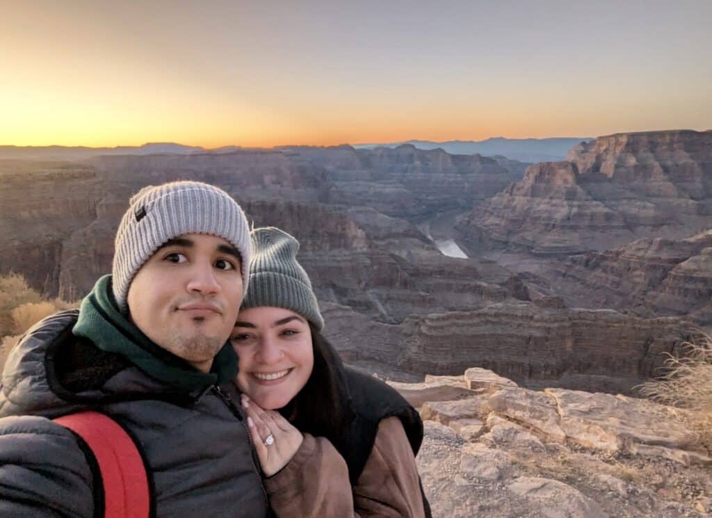 Newly engaged couple taking a selfie for their Grand Canyon marriage proposal. 