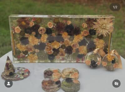 yellow, red, pink and dark flowers pressed into a clear box, Orlando, FL