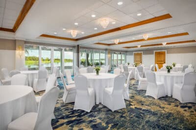 wedding reception, round tables, white tablecloths, white chair covers, ballroom, Orlando, FL