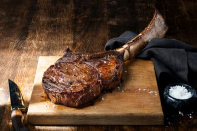 tomahawk steak, served on a board, Orlando, FL
