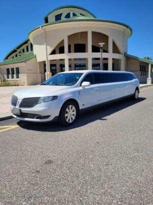 white limousine in front of a venue, Southern Elegance Limousines, Orlando, FL