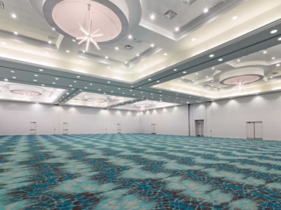 empty ballroom with white lights and green carpet, Orlando, FL