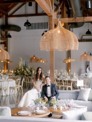 indoor reception, bride and groom posing for the camera, table settings, pavilion, Orlando, FL